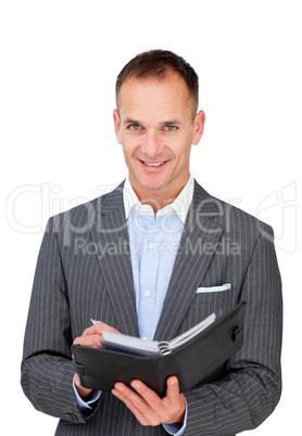 Assertive businessman holding an agenda