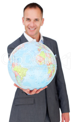 Cheerful businessman holding a terreatrial globe