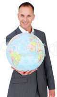 Cheerful businessman holding a terreatrial globe