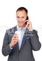 Attractive businessman talking on phone