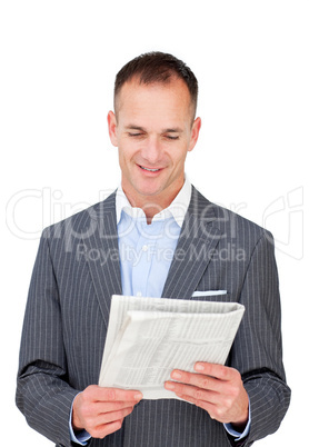 Positive businessman reading a newspaper