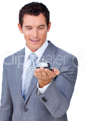 Attractive caucasian businessman showing a service bell