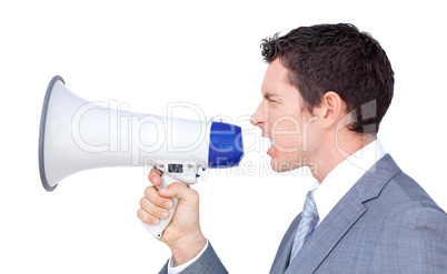 Angry businessman yelling through a megaphone