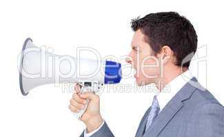 Angry businessman yelling through a megaphone