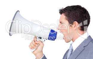 Young businessman yelling through a megaphone