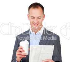 Attractive businessman holding a drinking cup