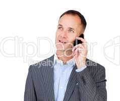 Confident mature businessman talking on phone