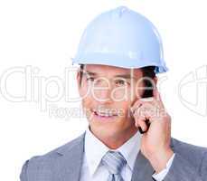 Self-assured male architect talking on phone