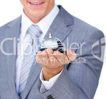 Close-up of a businessman holding a service bell
