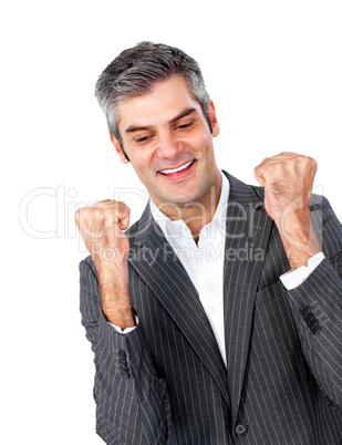 Mature businessman punching the air in celebration