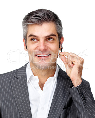 Confident businessman using headset