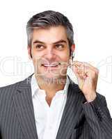 Confident businessman using headset