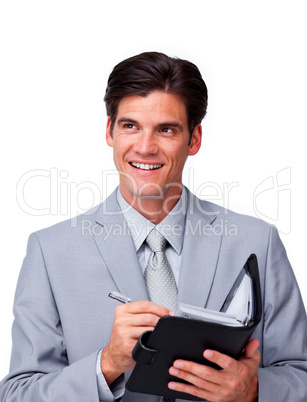 Attractive businessman holding an agenda