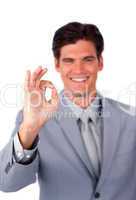 Cheerful businessman showing OK sign
