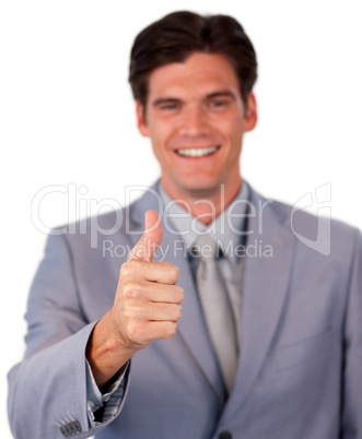 Smiling businessman with thumb up