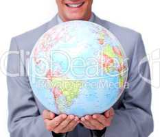 Close-up of a businessman holding a terrestrial globe