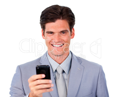 Joyful businessman sending a text