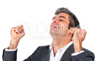 Succesful businessman punching the air in celebration