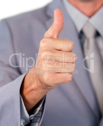 Close-up of a businessman with thumb up