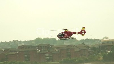 Helicopter chasing power boats