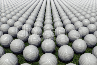 Hundreds of golf balls lined up on a meadow