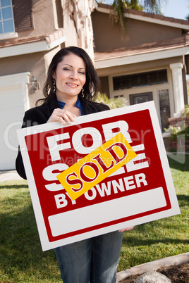 Hispanic Woman Holding Sold For Sale By Owner Real Estate Sign I