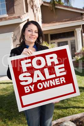 Hispanic Woman Holding For Sale By Owner Real Estate Sign In Fro