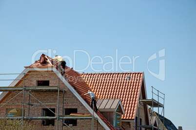 Roofers at work