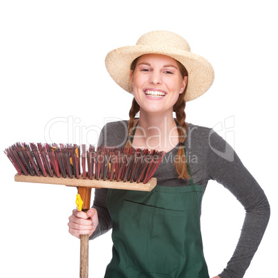 Gärtnerin mit Besen