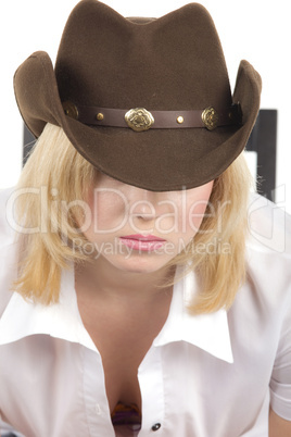 cowgirl in brown hat close-up