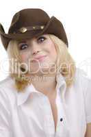 cowgirl in brown hat look and smile
