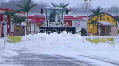 Snow Plow Clearing Lot