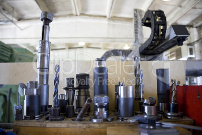 old industrial  tools in a row on factory