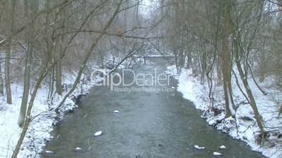 Creek with Snow Falling
