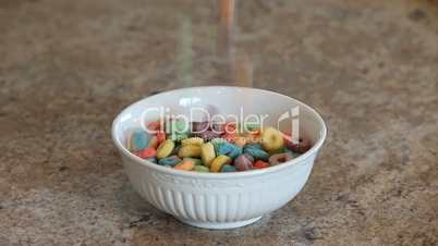 Cereal bright loops into bowl close