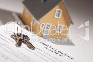 Foreclosure Notice, House Keys and Model Home on Gradated Backgr