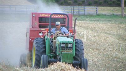 Farmer Baling Hay