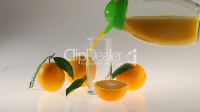 natural Orange juice pour in glass