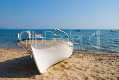 Plastic boat on beach