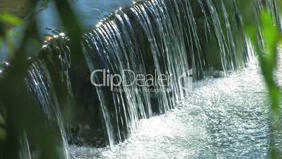 HD Little waterfalls in a peaceful wood, closeup