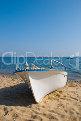 Plastic boat on beach