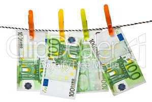 Euro banknotes on a rope studio isolated