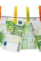 Euro banknotes on a rope studio isolated