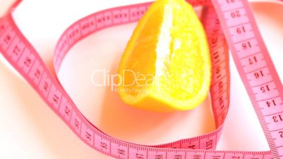 Orange with tape measure rotates