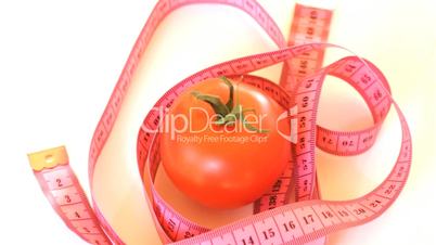 Tomato with tape measure rotates , loopable