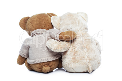 Back view of two Teddy bears hugging each other