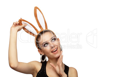 Young playful woman with bunny ears