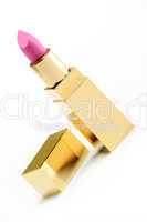 Pink golden lipstick over white