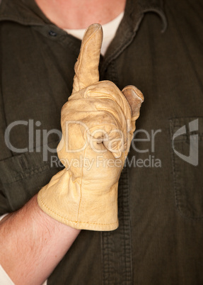 Man with Leather Construction Glove and Number One Gesture