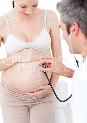 Beautiful pregnant woman and her gynecologist